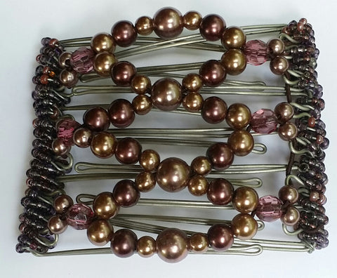 7 tooth. Smokey copper, mauve, burgandy...