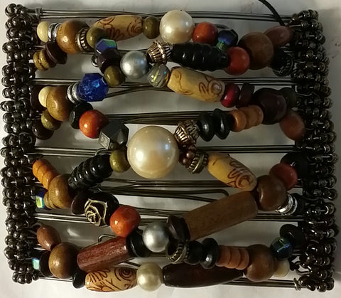 9 tooth, wood and pearls