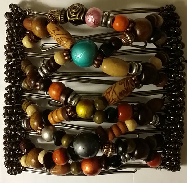 9 tooth,  glass foil beads in center, wood mix.