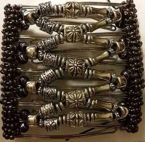 9 tooth all silver beads, brownish iridescent beaded  spine