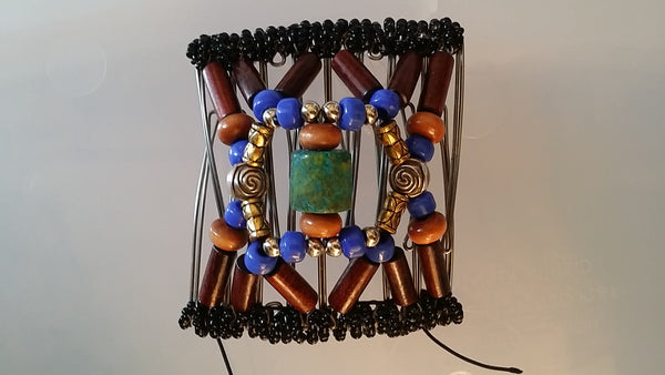 Wood, beautiful blue glass pony beads and turquoise center bead