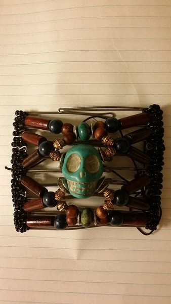 9 tooth wood beads and turquoise skull center pendant